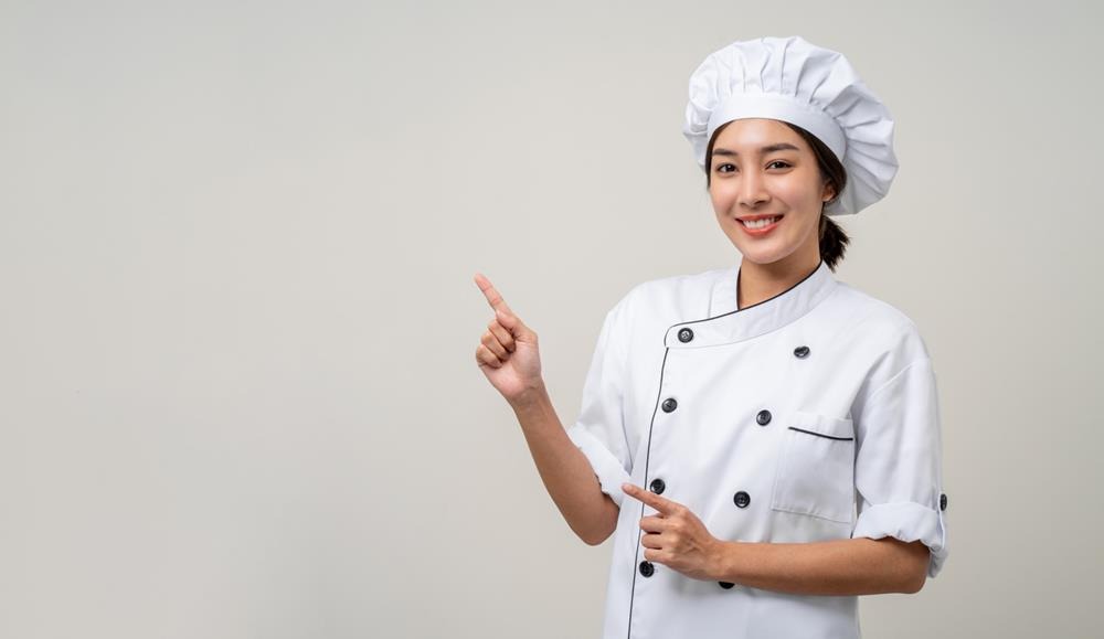 A young sous chef pointing finger