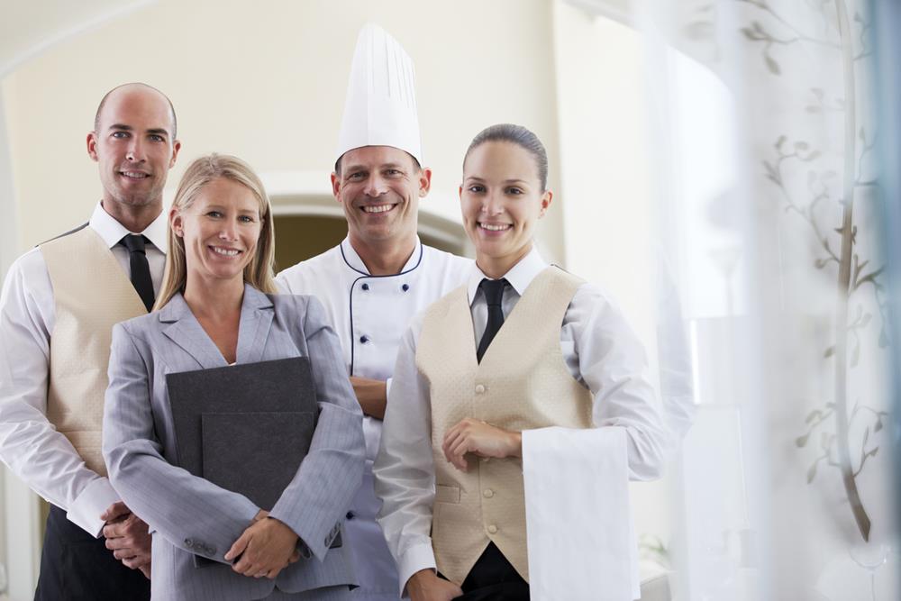 Staff smiling in restaurant
