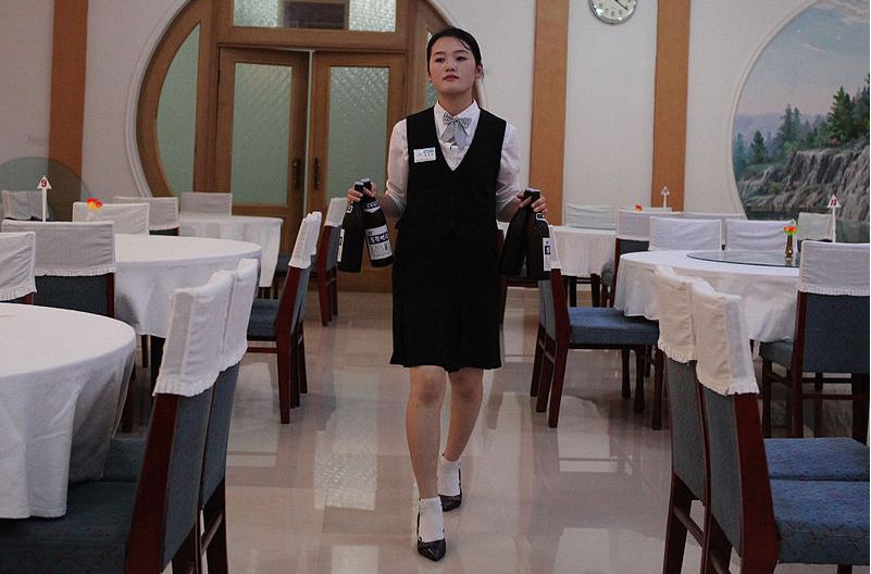 A waitress in a hotel, North Korea